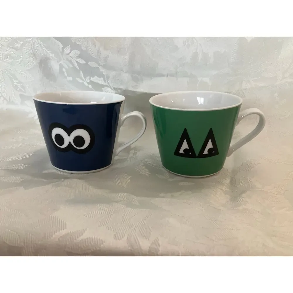 IKEA Glödande Mug Set Poland Blue Green Face Espresso Cups Set of 2